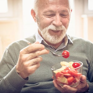 Dentures patient in Upper Arlington eating