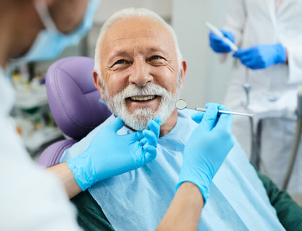 Man smiling in the dental chair